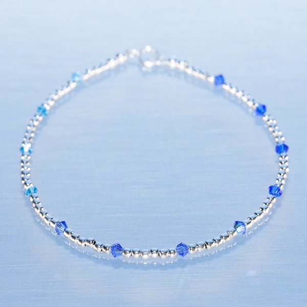 Sale-dainty sterling silver and blue swarovski bracelet