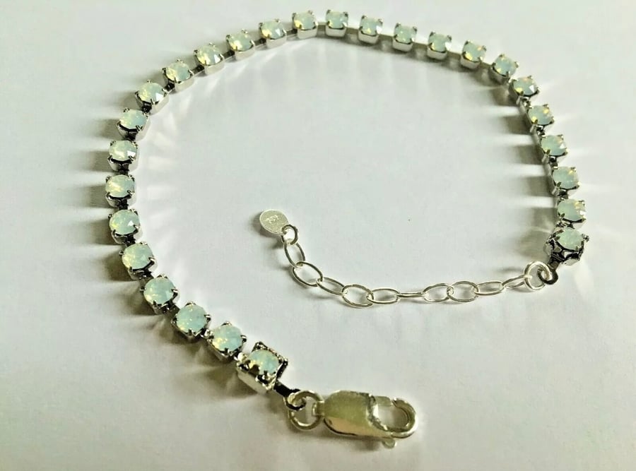 Swarovski  Crystal 4mm White Opal colour stones Tennis Bracelet 7" length . 