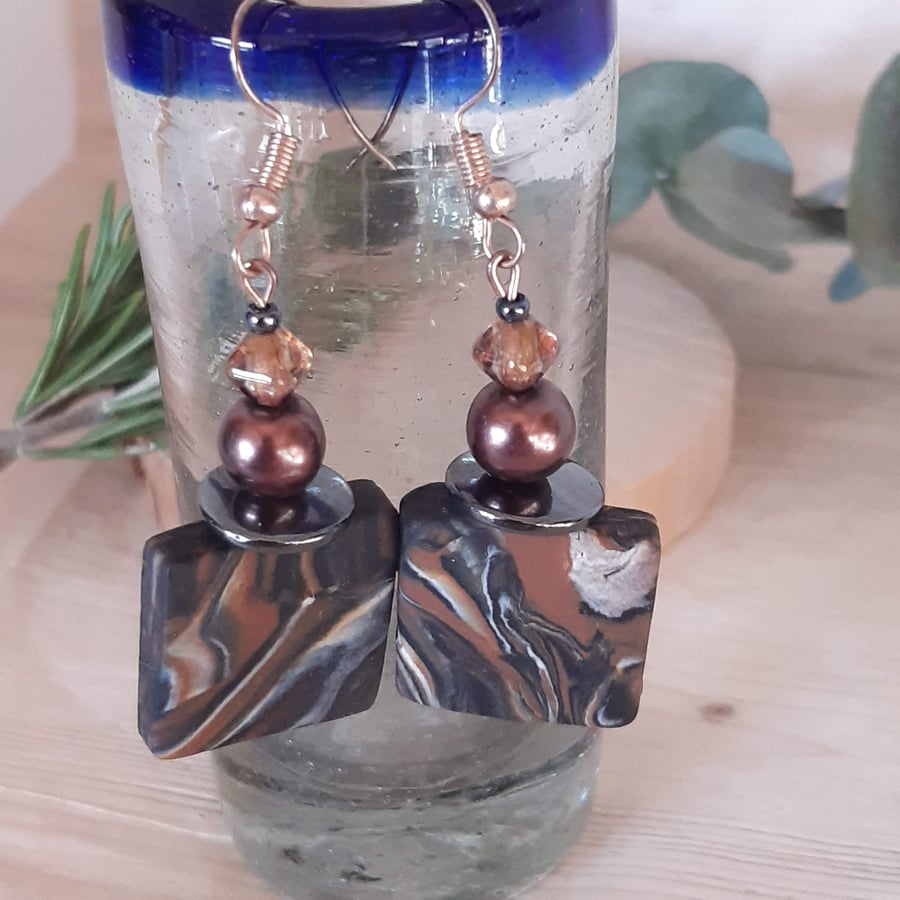 Handmade square polymer clay earrings in earthy browns and black