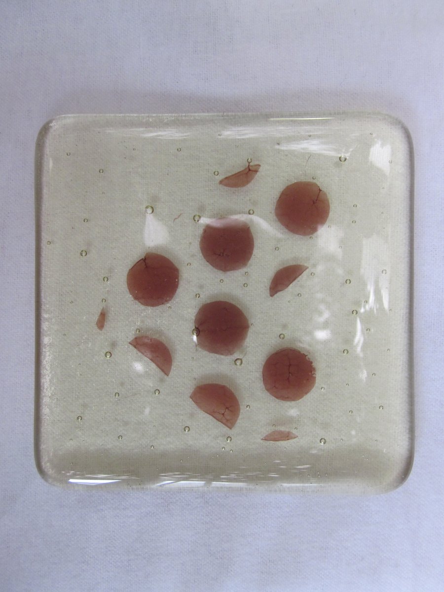 Handmade fused glass coaster - red dot heart on pale yellow tint