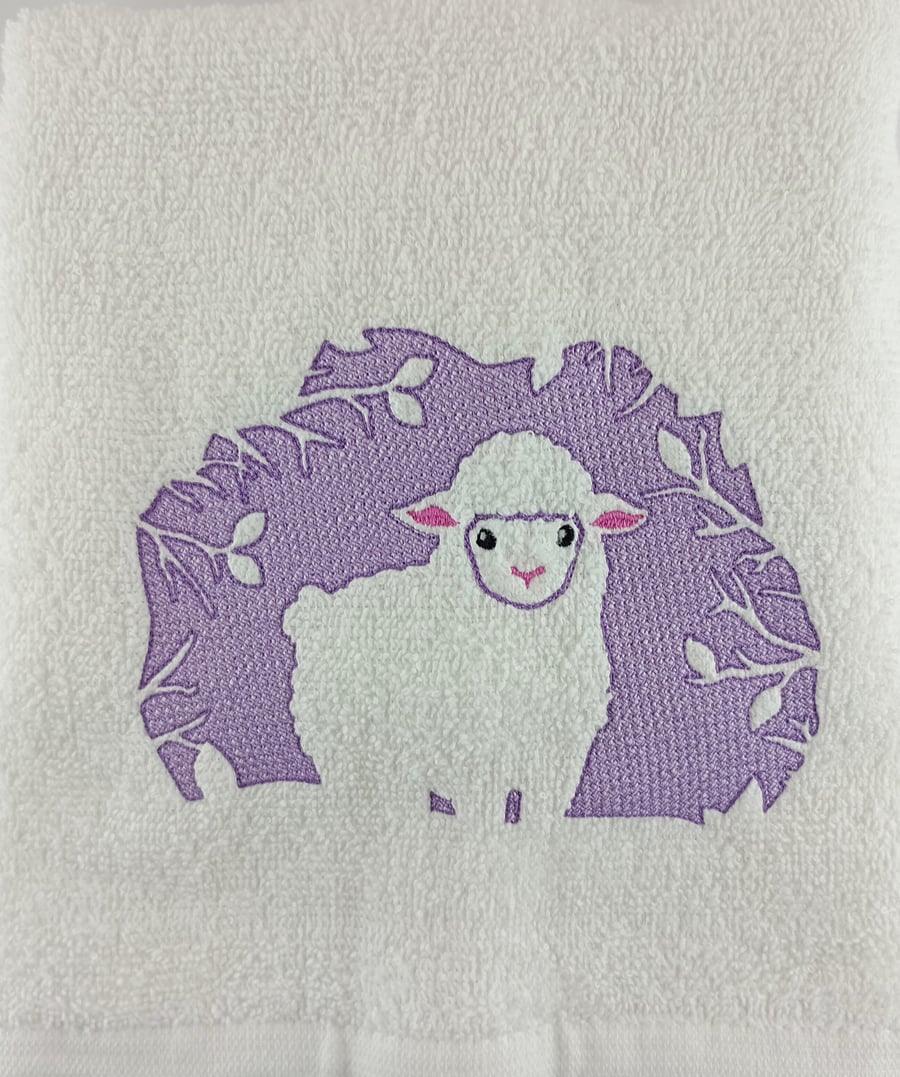 Cute Lamb embroidered and embossed on a white hand towel
