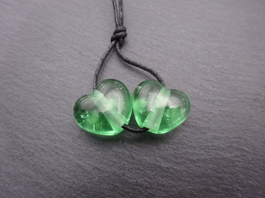 lampwork glass beads, green heart pair