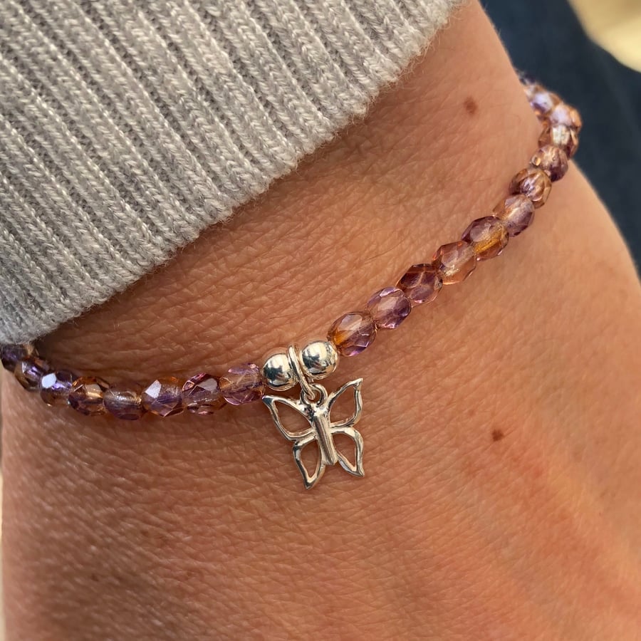 Faceted Czech glass beaded bracelet with butterfly charm