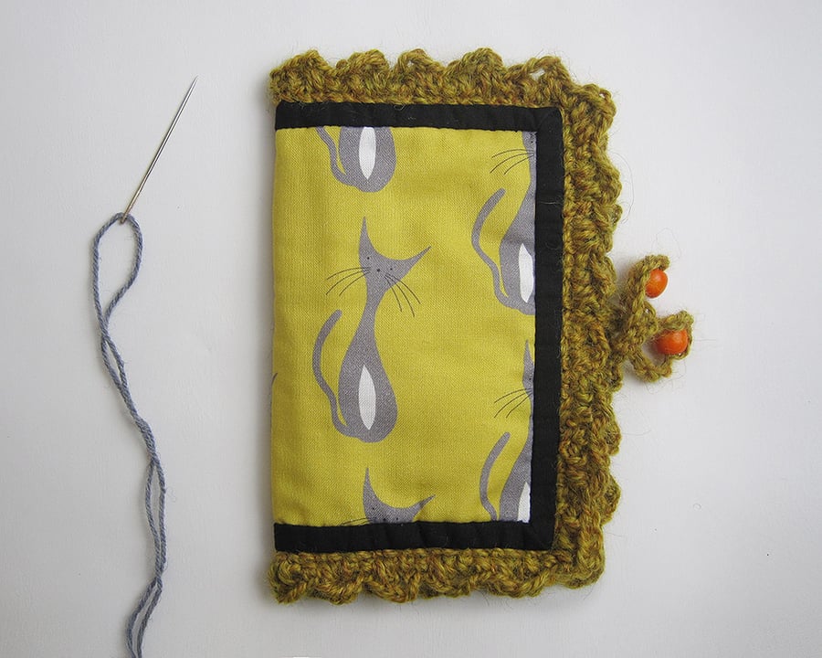 Needle case with cat print and crochet trim