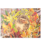 Snug As A Bug Baby Hedgehog in Autumn Foliage Glass Chopping Board