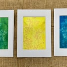  Trio of hand printed ornamental grass pictures.