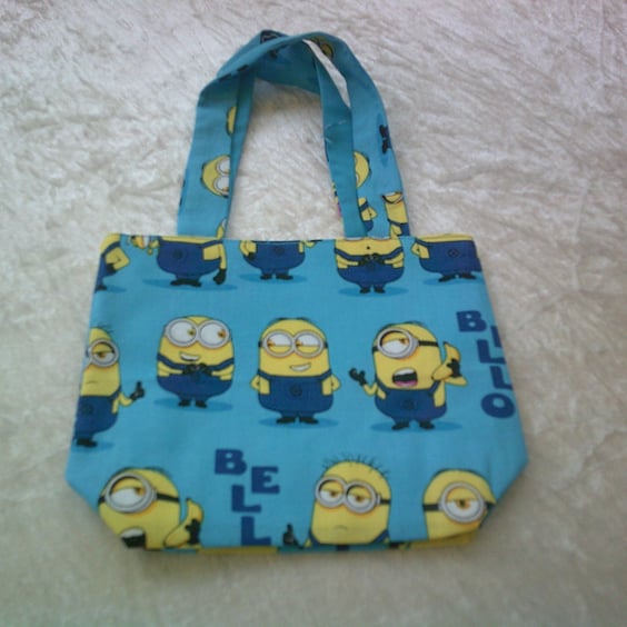 Minions on blue fabric bag