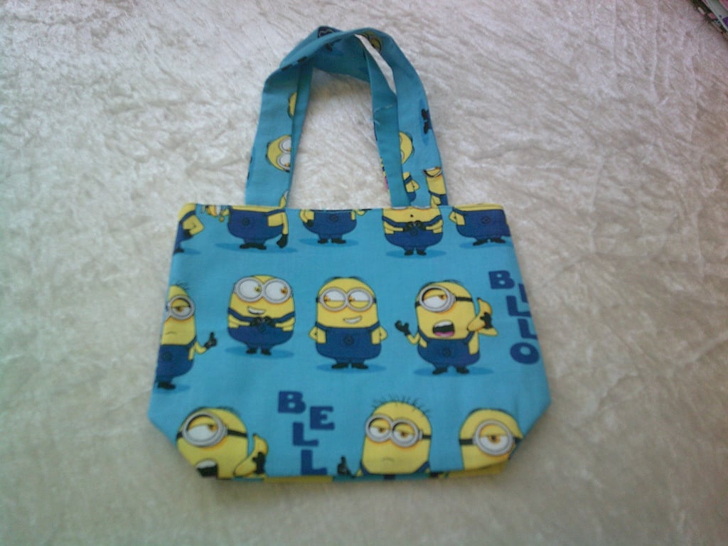 Minions on blue fabric bag