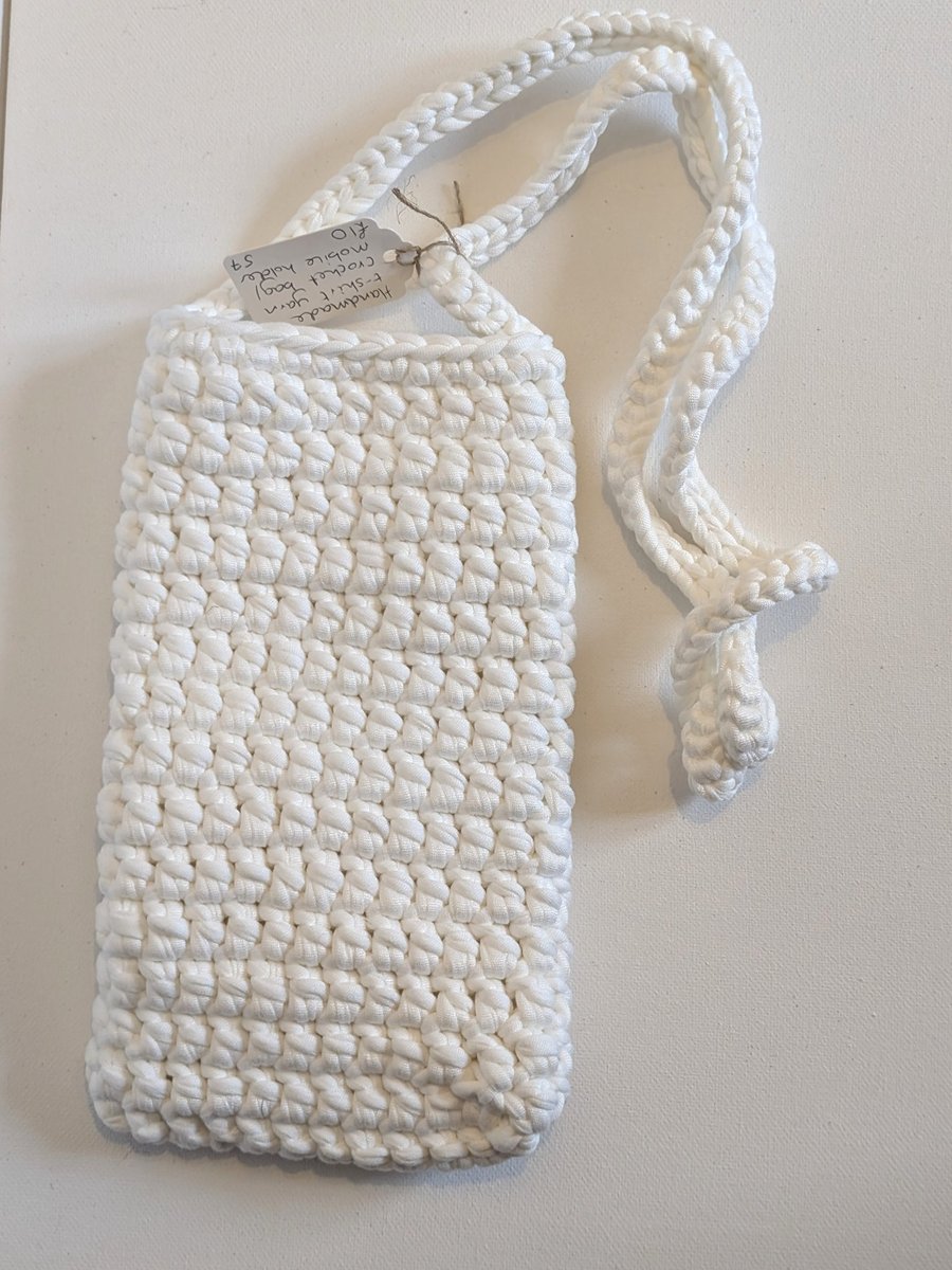 Handmade crochet crossbody bag made with white t-shirt yarn 