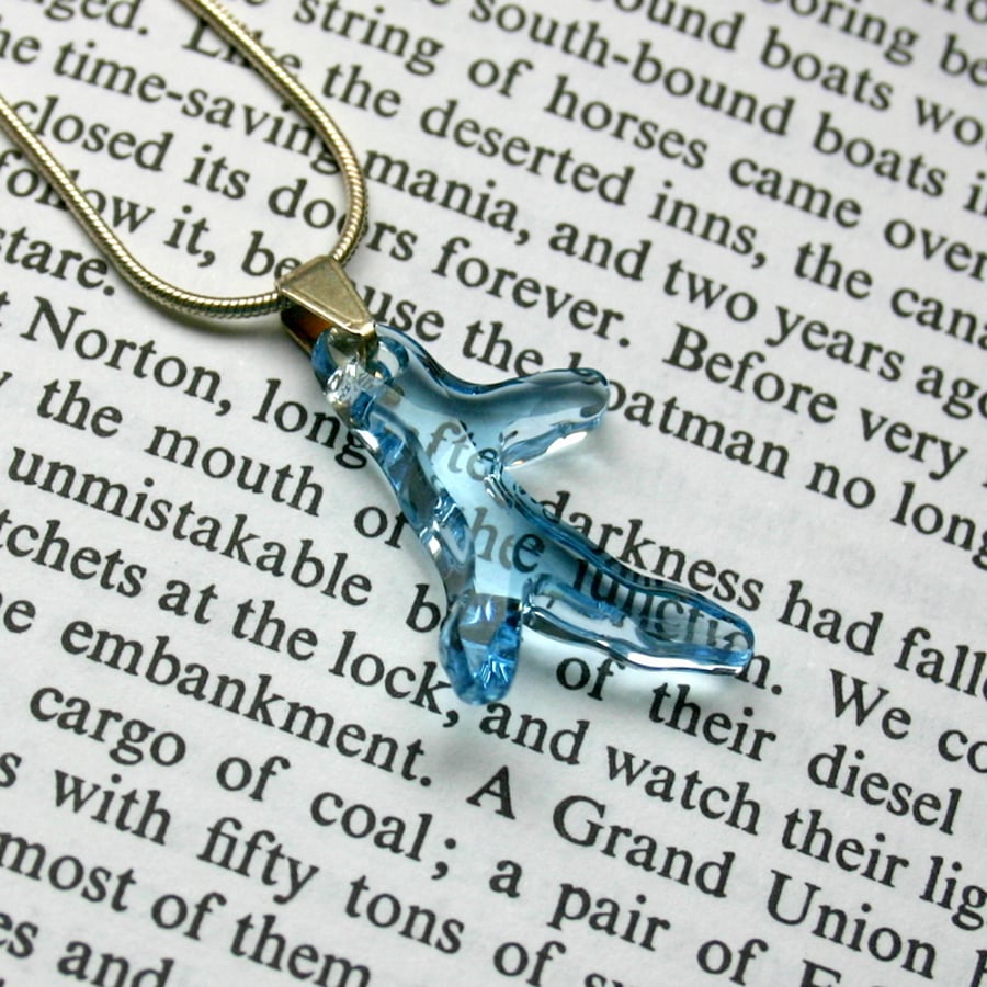 Swarovski blue coral pendant on a sterling silver snake chain.