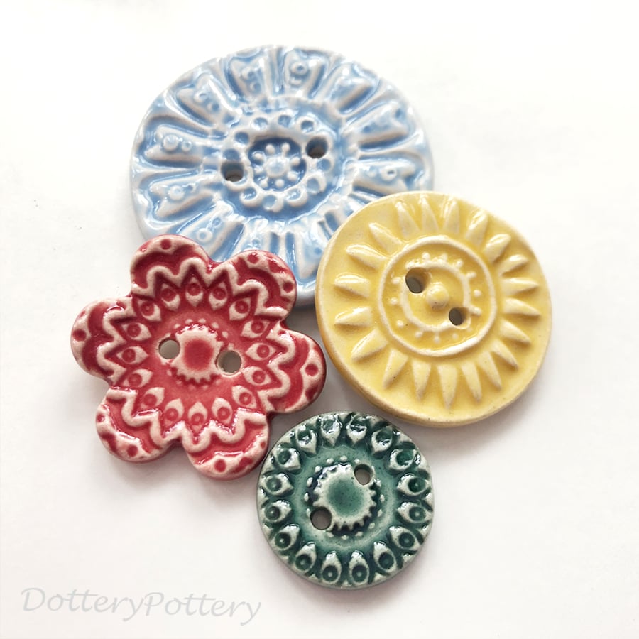 Set of four handmade ceramic buttons