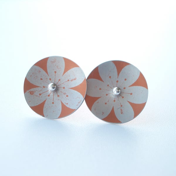 Flower studs in orange and silver