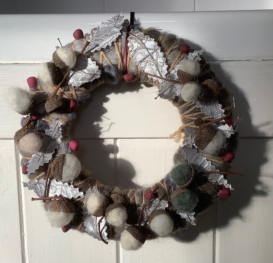 WINTER wool-winding and needle-felting celebrating the season. Original one off.