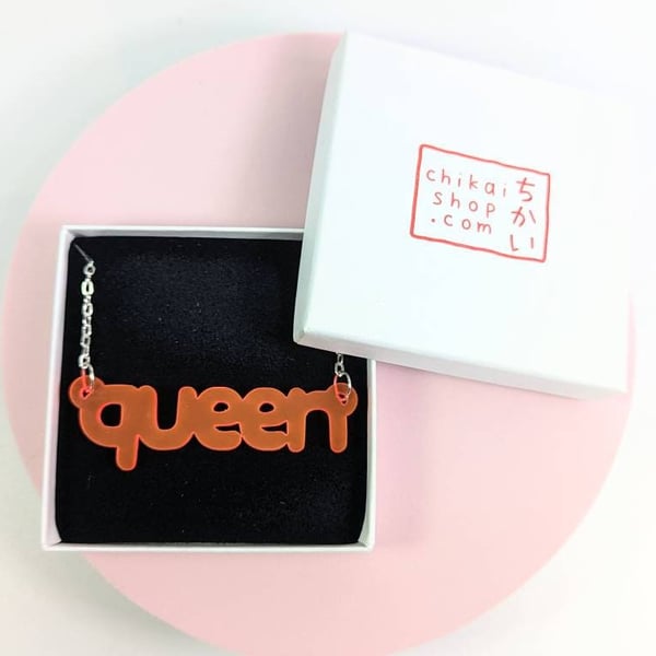 Queen necklace on neon pink translucent acrylic with silver plated chain