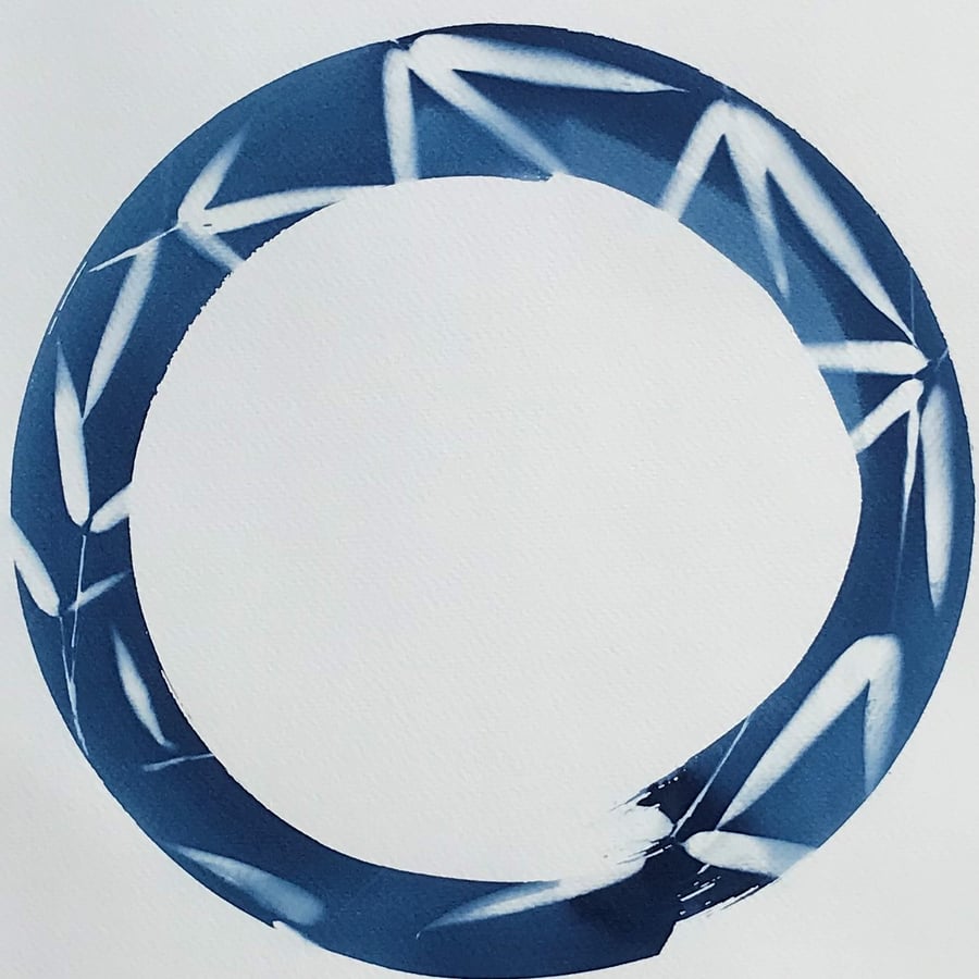 Enso embraces Bamboo leaves in a Cyanotype Photogram.