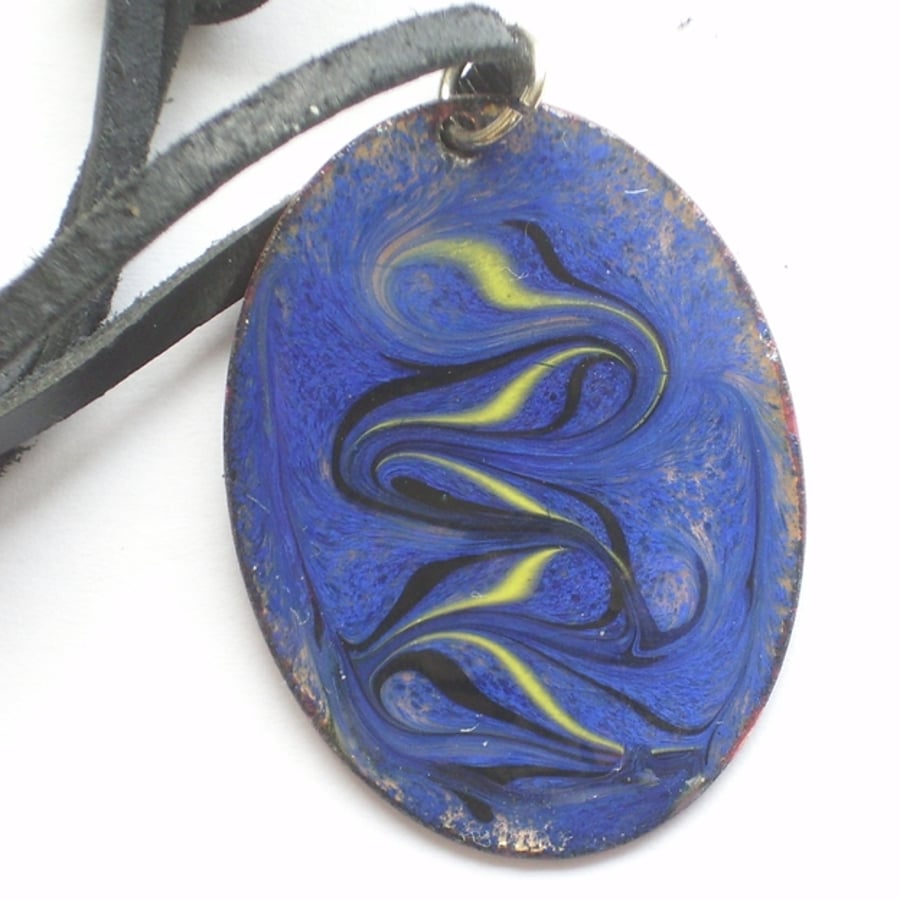 oval pendant on thong - blue, yellow, black