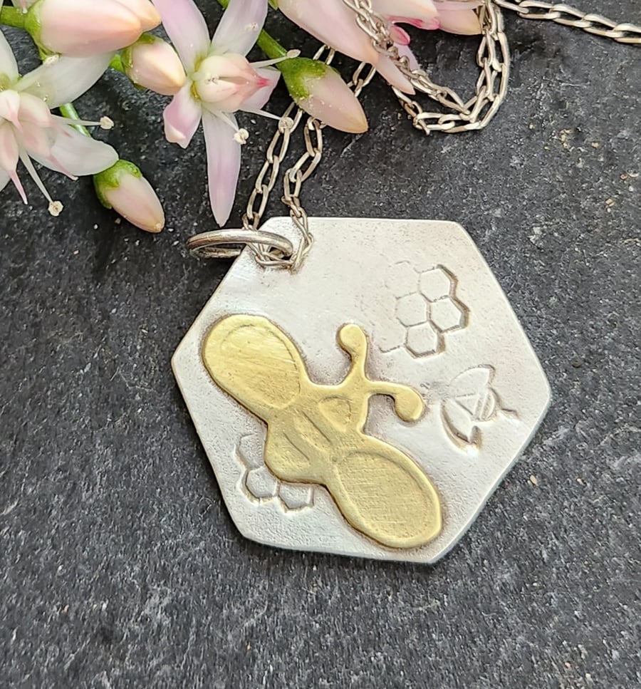 Brass bee on sterling silver hexagon pendant