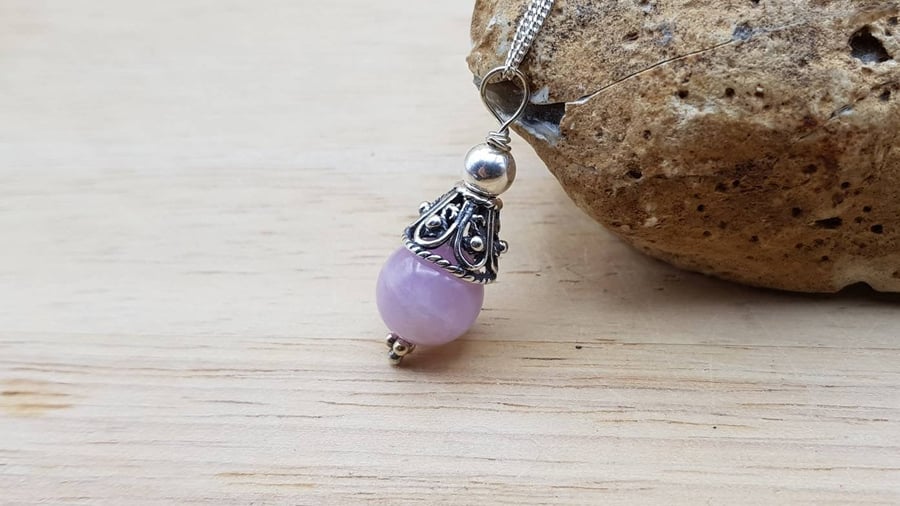 Minimalist Pink Kunzite cone pendant necklace.