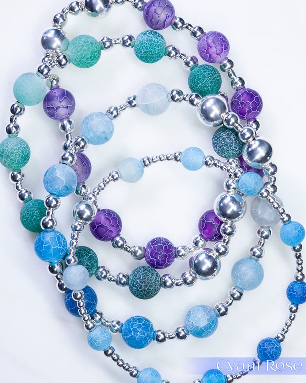 Beaded bracelet with crackle glass and sterling silver green blue stretchy