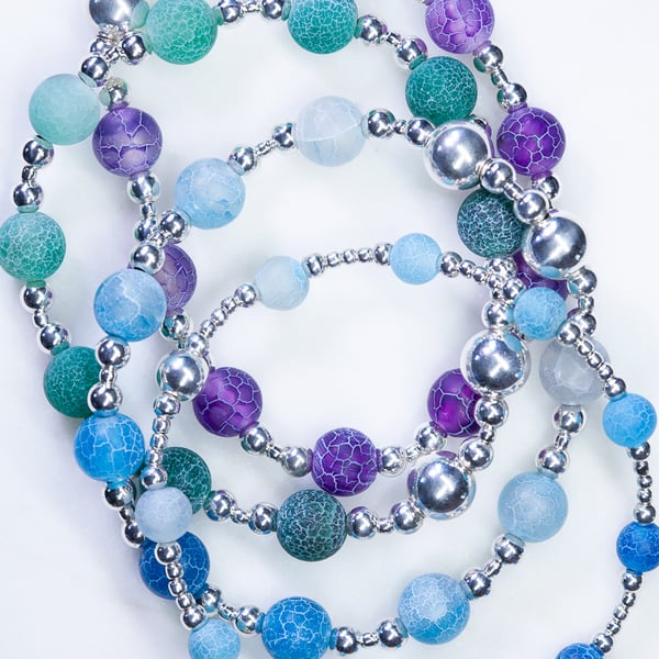 Beaded bracelet with crackle glass and sterling silver green blue stretchy