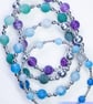 Beaded bracelet with crackle glass and sterling silver green blue stretchy - Image 1