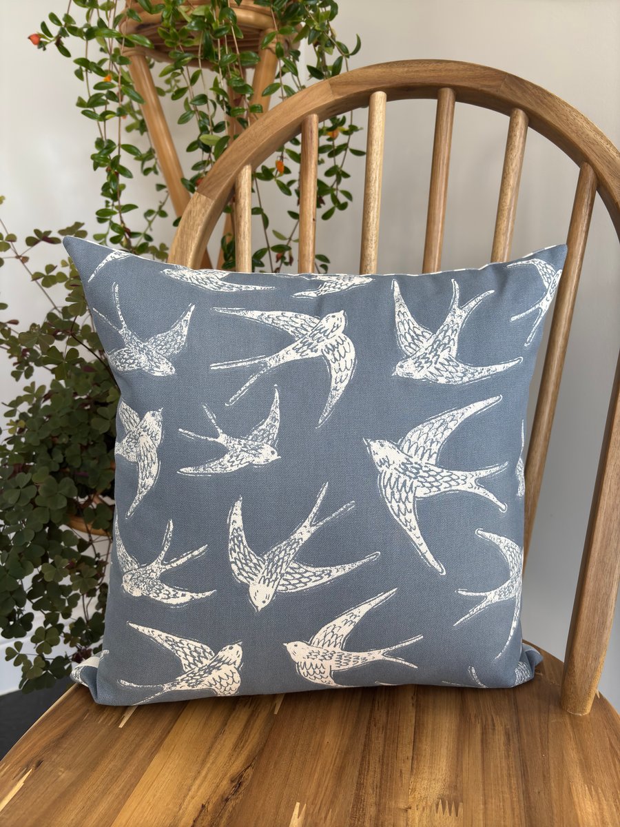 Cushion cover with a bird print in navy and white with striped back, 40cm x 40cm