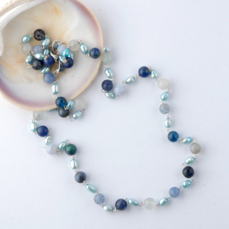 Blue gemstones and pearl necklace
