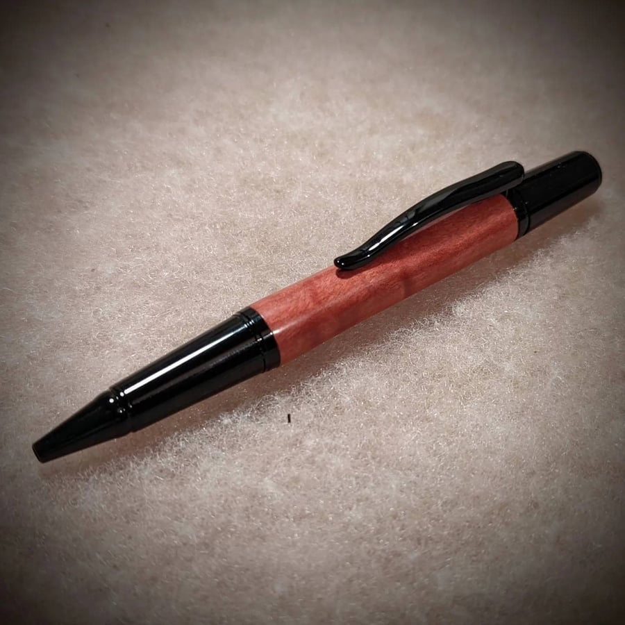 Handmade pink Ivory wooden ballpoint pen with black fittings - rare premium wood