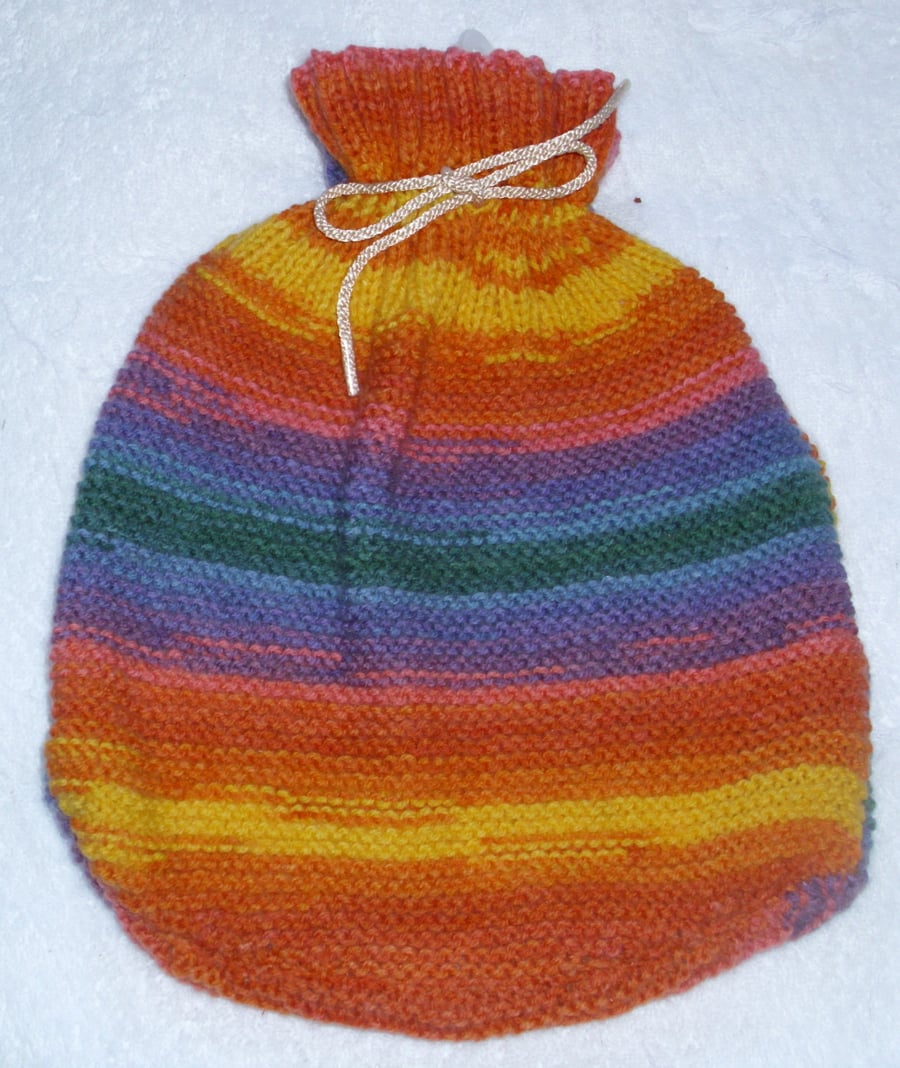 Hand Knitted rainbow stripe waterbottle cover with bottle