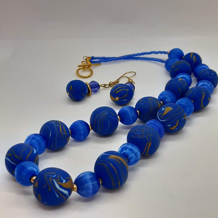 Royal blue and gold polymer necklace and earrings set