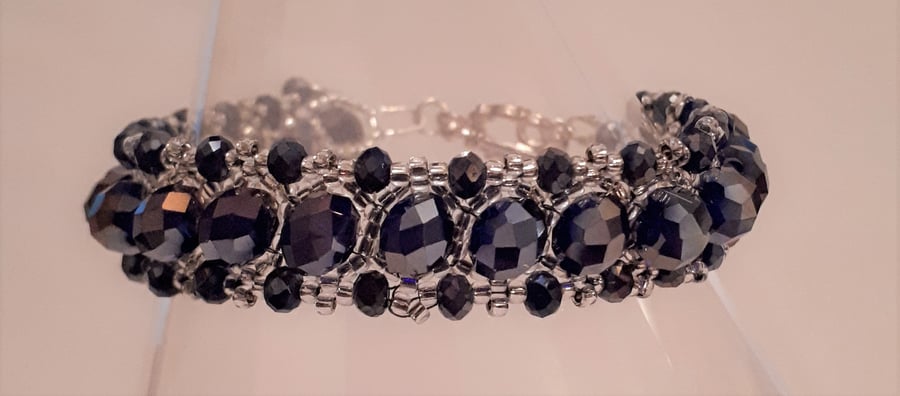 Dark blue crystal and silver seed bead bracelet
