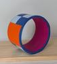 Dynamic blue colour block bangle with contrast orange and fuchsia  - Image 3