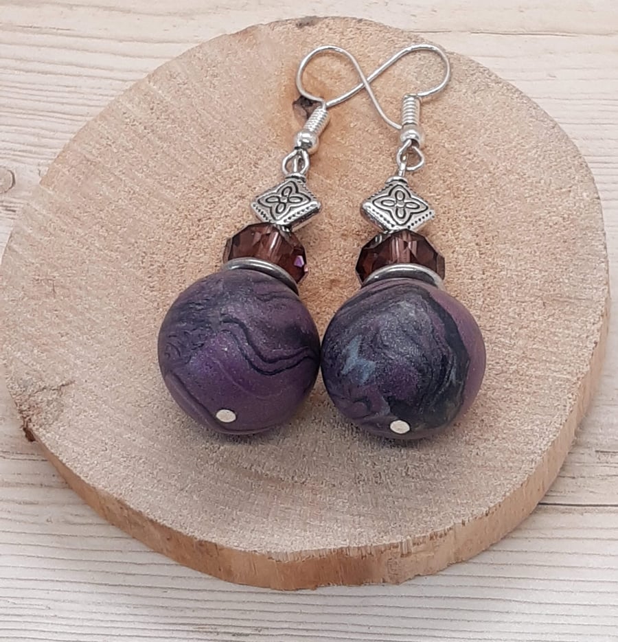 Large mauve, black and silver dangly earrings