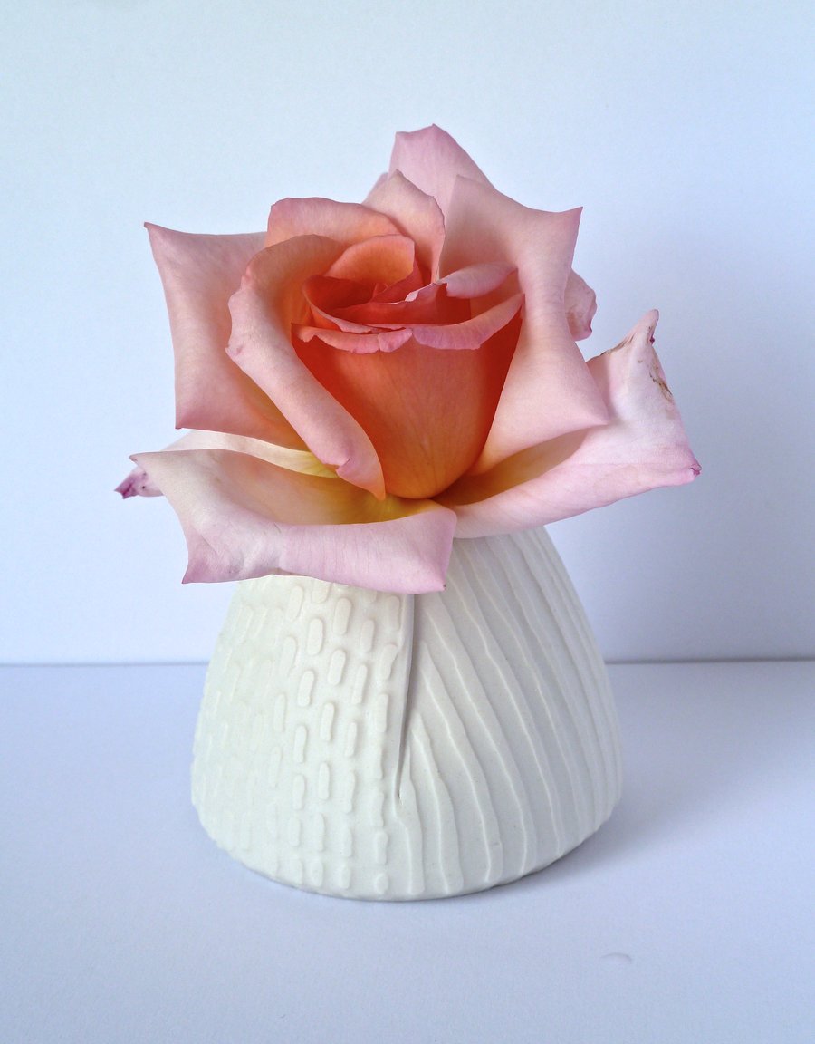 A unique porcelain posy vase , hand made in Winchester