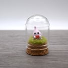 small glass wisp with heart