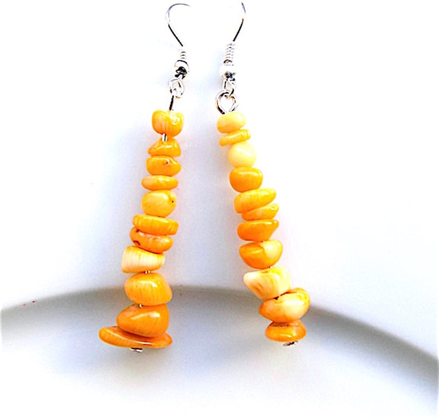 Earrings for pierced ears, sensational yellow coral dangles.