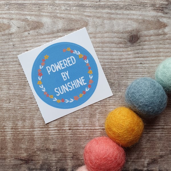 Powered by Sunshine 38mm Round Sticker