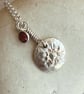 Botanical silver pendant with strawberry flower and a ruby charm. - Image 3