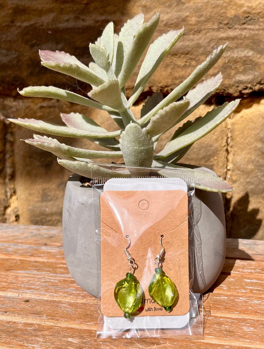 Green beaded dangle earrings