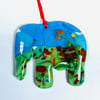 Colourful glass elephant hanging decoration.