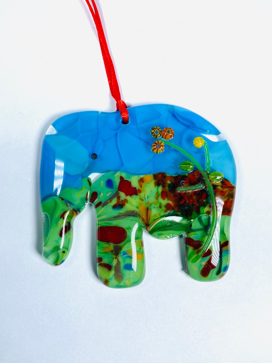Colourful glass elephant hanging decoration.