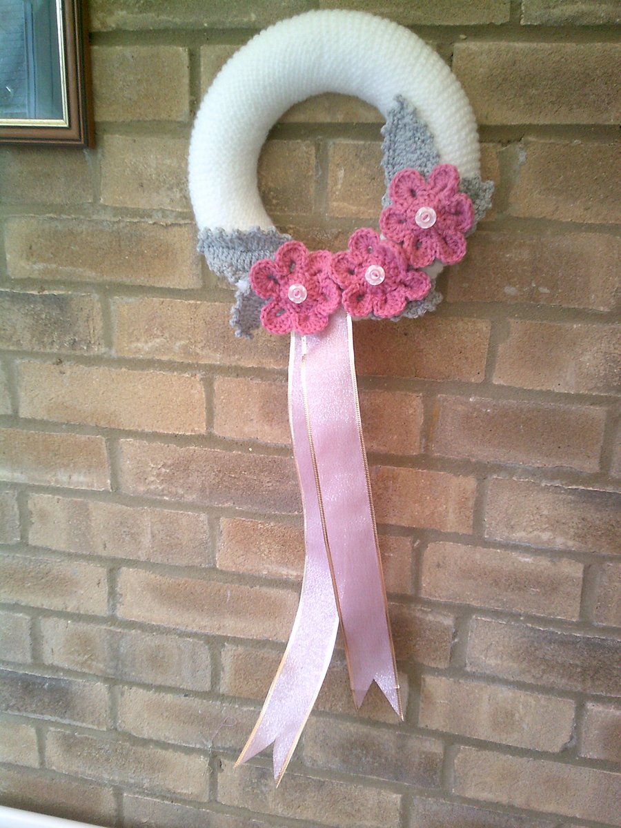 25cm Hand Knitted Wreath in White with Pink Flowers and Silver Leaves