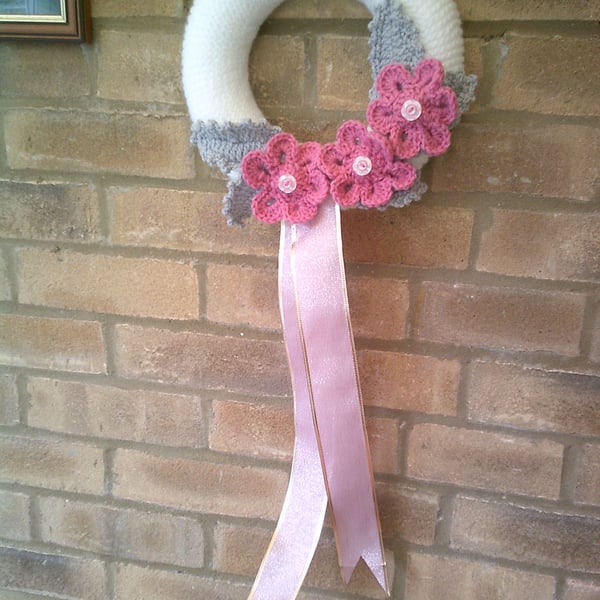 25cm Hand Knitted Wreath in White with Pink Flowers and Silver Leaves