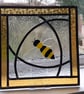 Leaded stained glass panel with fused glass bee design