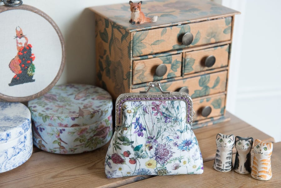 Coin purse made with wild flower print Liberty Lawn and purple lining