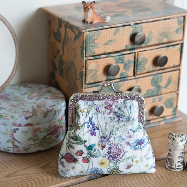 Coin purse made with wild flower print Liberty Lawn and purple lining