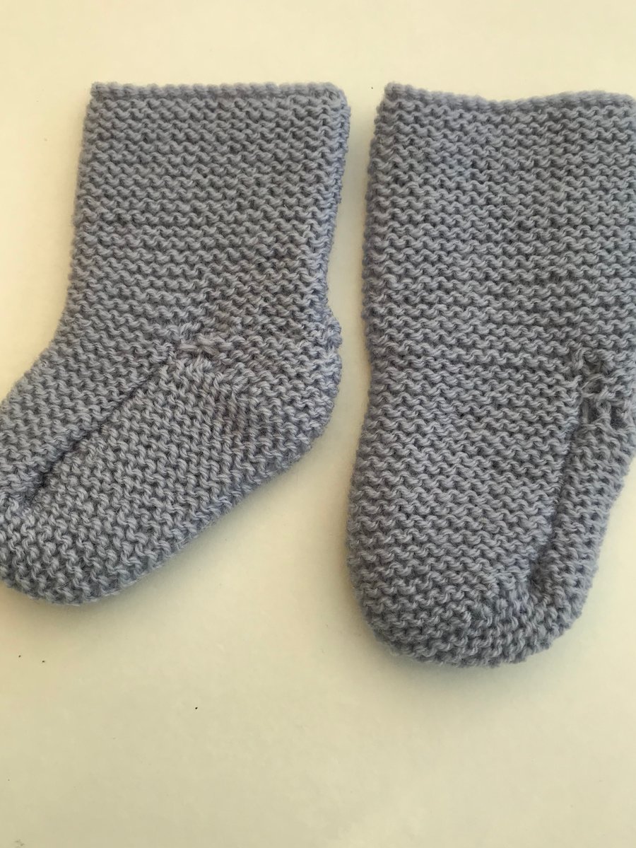 Hand knitted baby bootees