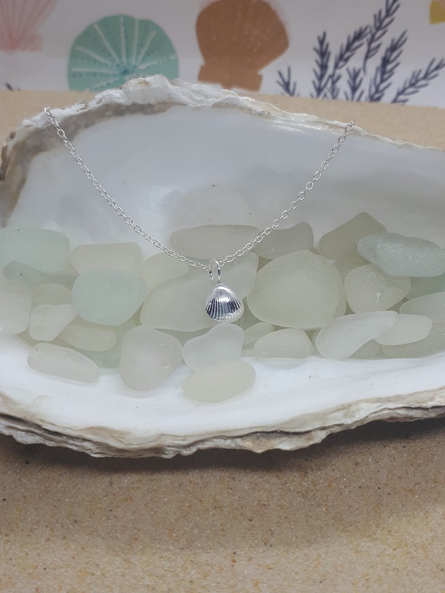 Small fine silver cockle shell pendant