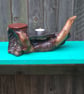 Hand-carved rustic wood pipe stand