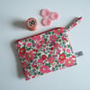 Liberty print zip up makeup bag or purse, with pink flowers.